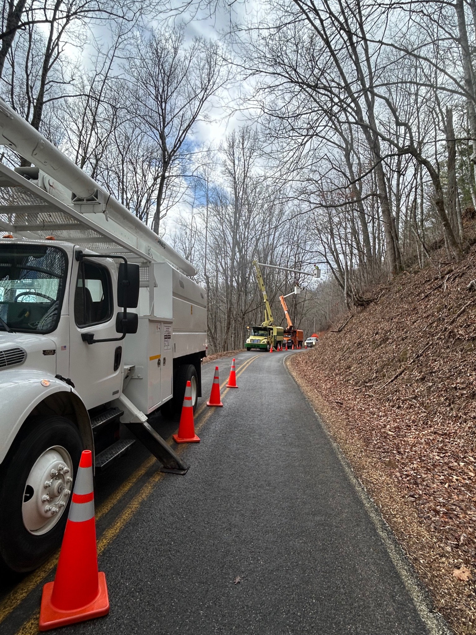 Storm cleanup with multiple bucket trucks